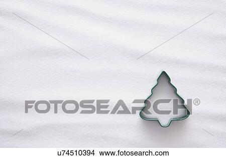 Pastry cutter in christmas tree shape against white backgrounds View Large Photo Image Picture - Pastry cutter in christmas tree shape against white backgrounds. Fotosearch