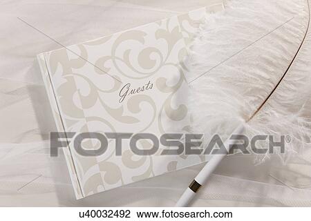 Pen by guest book View Large Photo Image Stock Image - Pen by guest book. Fotosearch