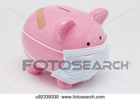 Piggy bank wearing surgical mask, studio shot View Large Photo Image Stock Image - Piggy bank wearing surgical mask, studio shot. Fotosearch