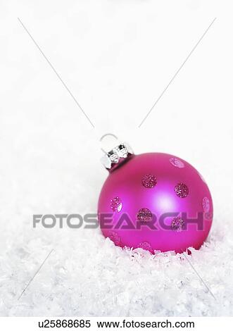 Pink Christmas bauble on snow View Large Photo Image Stock Photography - Pink Christmas bauble on snow. Fotosearch