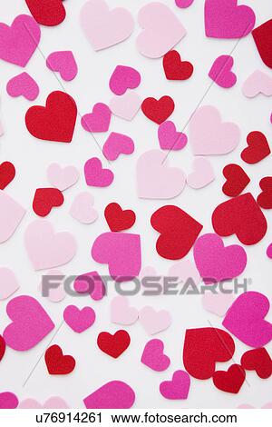 Pink, red and white hearts on white background View Large Photo Image Stock Image - Pink, red and white hearts on white background. Fotosearch