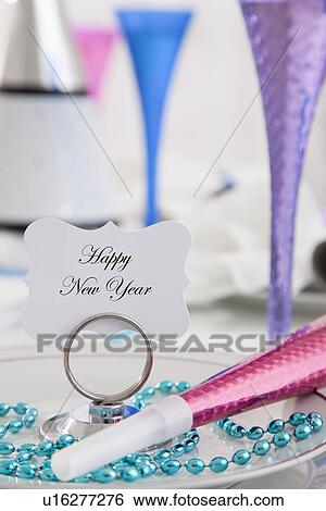 Place setting with card 'Happy New Year' View Large Photo Image Stock Photograph - Place setting with card 'Happy New Year'. Fotosearch