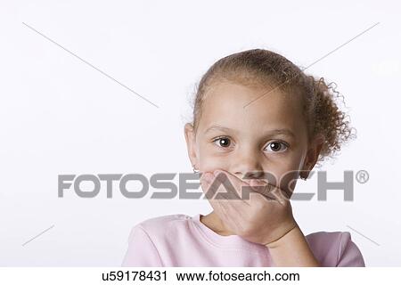 Portrait of girl (6-7) covering mouth View Large Photo Image Stock Image - Portrait of girl (6-7) covering mouth. Fotosearch