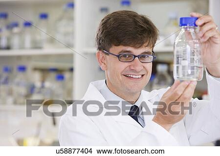 Picture - Portrait of mid adult scientist. Fotosearch