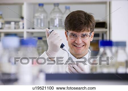 Portrait of mid adult scientist View Large Photo Image Stock Image - Portrait of mid adult scientist. Fotosearch