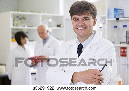 Portrait of mid adult scientist View Large Photo Image Stock Image - Portrait of mid adult scientist. Fotosearch