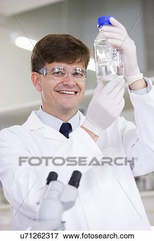 Portrait of mid adult scientist View Large Photo Image Stock Photo - Portrait of mid adult scientist. Fotosearch