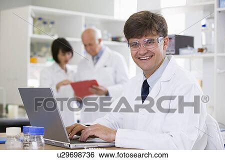 Portrait of mid adult scientist View Large Photo Image Stock Photograph - Portrait of mid adult scientist. Fotosearch