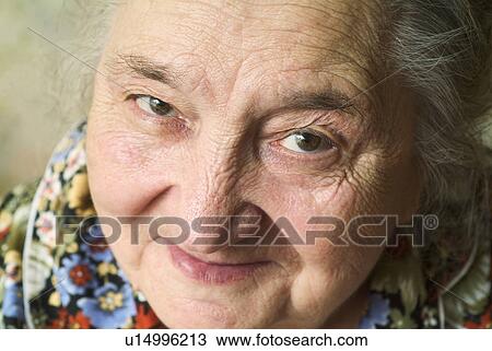 Stock Image - Portrait of senior woman. Fotosearch