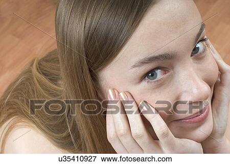 Portrait of smiling teenage girl (16-17) View Large Photo Image Stock Photo - Portrait of smiling teenage girl (16-17). Fotosearch