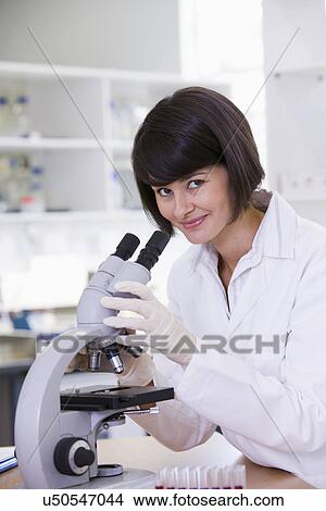 Portrait of young female scientist View Large Photo Image Picture - Portrait of young female scientist. Fotosearch