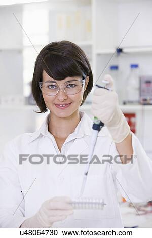 Portrait of young female scientist View Large Photo Image Stock Image - Portrait of young female scientist. Fotosearch