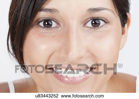 Stock Image - Portrait of young woman. Fotosearch