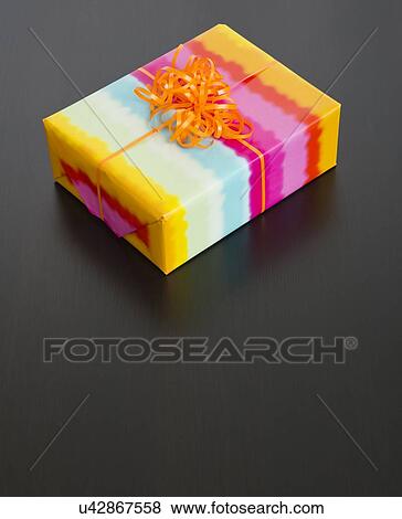 Present on black background View Large Photo Image Stock Photo - Present on black background. Fotosearch