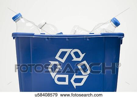 Stock Photo - Recycling bin with plastic bottles, studio shot. Fotosearch