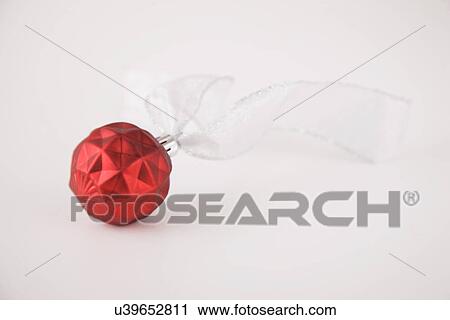 Stock Image - Red Christmas bauble. Fotosearch