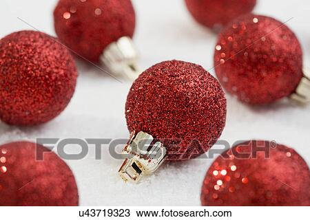 Red Christmas ornaments on white background View Large Photo Image Stock Image - Red Christmas ornaments on white background. Fotosearch