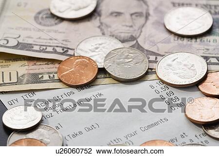 Restaurant receipt and money View Large Photo Image Stock Image - Restaurant receipt and money. Fotosearch