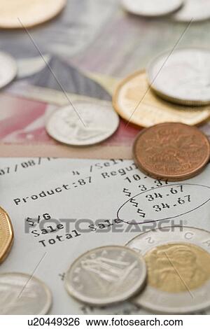 Stock Photograph - Restaurant receipt and money. Fotosearch