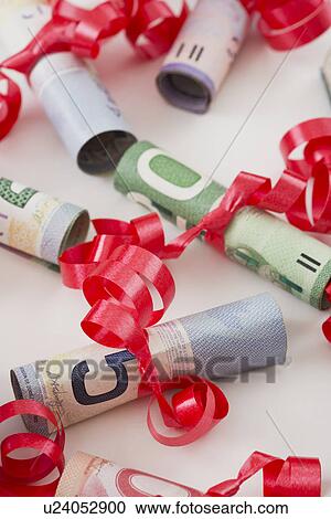 Rolled up dollar bills View Large Photo Image Stock Image - Rolled up dollar bills. Fotosearch
