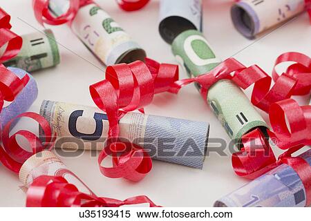 Rolled up dollar bills View Large Photo Image Stock Photography - Rolled up dollar bills. Fotosearch