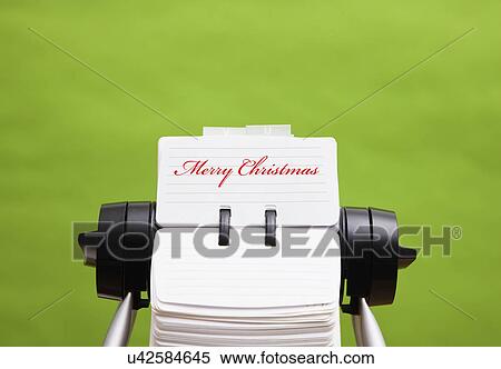 Stock Photography - Rotary card file with merry Christmas card. Fotosearch