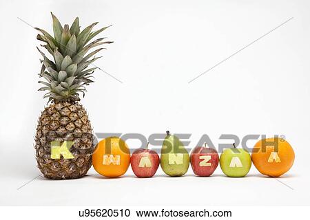 Stock Image - Row of fruits, studio shot. Fotosearch