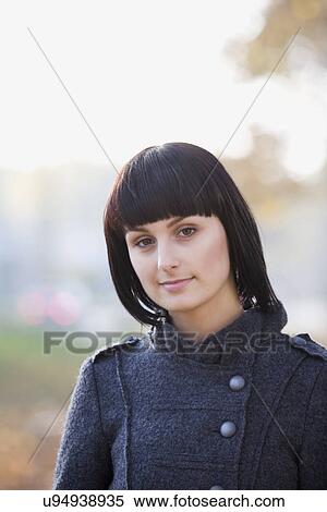 Russia, Voronezh, Portrait of young woman outdoors View Large Photo Image Stock Photography - Russia, Voronezh, Portrait of young woman outdoors. Fotosearch