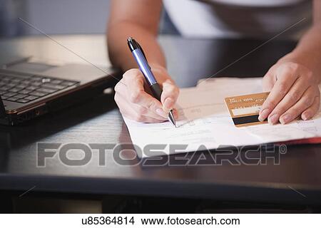 Russia, Voronezh, woman signing document View Large Photo Image Picture - Russia, Voronezh, woman signing document. Fotosearch