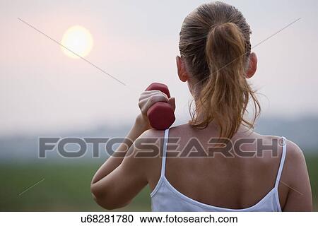 Russia, Voronezh, young woman exercising View Large Photo Image Stock Image - Russia, Voronezh, young woman exercising. Fotosearch