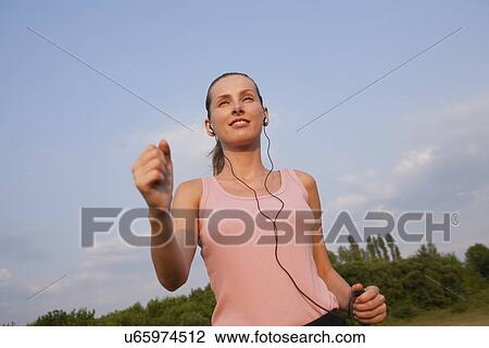 Russia, Voronezh, young woman jogging View Large Photo Image Stock Image - Russia, Voronezh, young woman jogging. Fotosearch