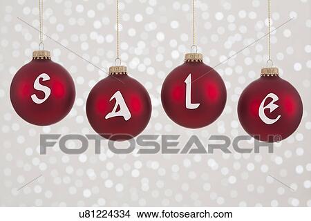 Picture - Sale sign on Christmas ornaments. Fotosearch