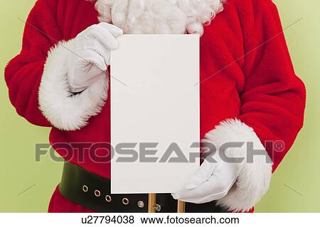 Santa clause holding blank letter View Large Photo Image Stock Photo - Santa clause holding blank letter. Fotosearch