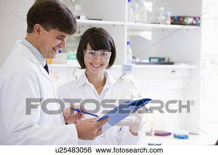 Scientists at work View Large Photo Image Stock Photograph - Scientists at work. Fotosearch