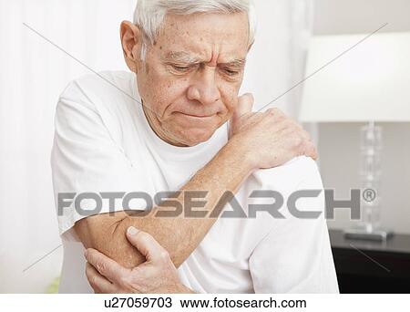 Senior man in pain View Large Photo Image Stock Image - Senior man in pain. Fotosearch