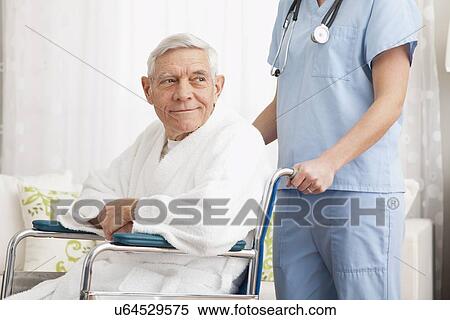 Stock Photography - Senior patient on wheelchair. Fotosearch