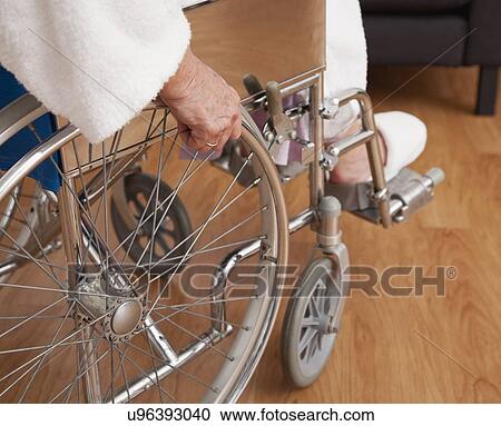 Senior woman on wheelchair, close-up View Large Photo Image Stock Image - Senior woman on wheelchair, close-up. Fotosearch