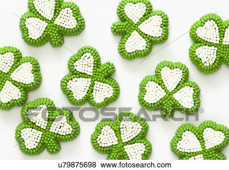Stock Photo - Shamrocks on white background. Fotosearch