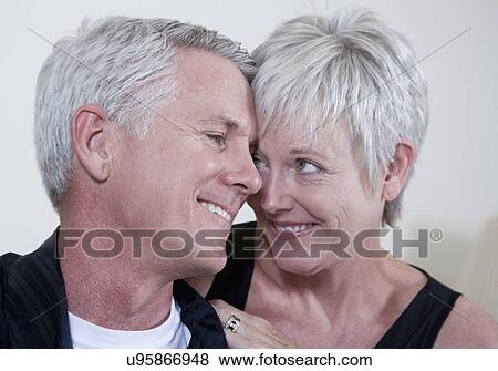 Stock Photo - Smiling mature couple. Fotosearch