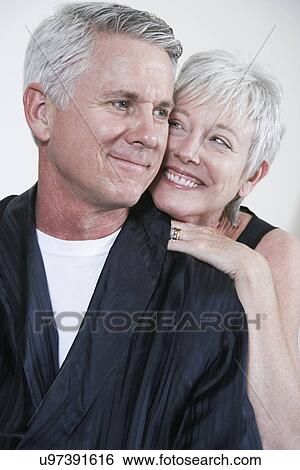 Stock Photograph - Smiling mature couple. Fotosearch