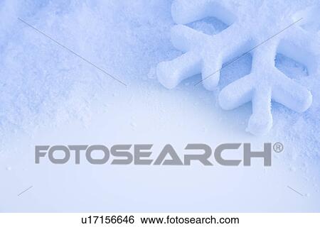 Stock Photograph - Snow flake on snow. Fotosearch