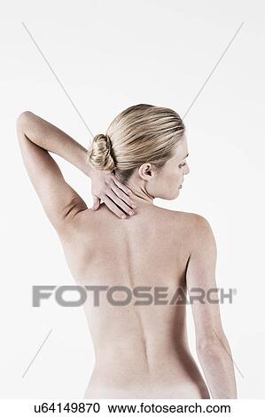 South Africa, Cape Town, Rear view of shirtless young woman touching neck View Large Photo Image Stock Image - South Africa, Cape Town, Rear view of shirtless young woman touching neck. Fotosearch