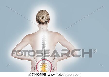 Stock Photograph - South Africa, Cape Town, Rear view of shirtless young woman suffering from backache. Fotosearch