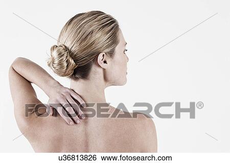 South Africa, Cape Town, Rear view of shirtless young woman touching neck View Large Photo Image Stock Photograph - South Africa, Cape Town, Rear view of shirtless young woman touching neck. Fotosearch