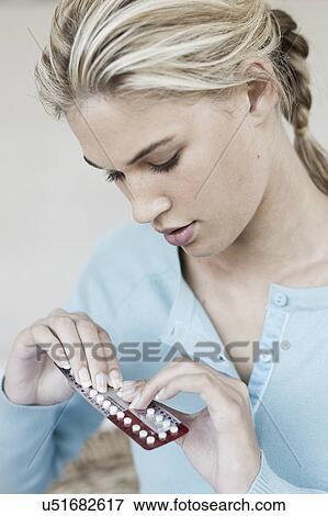 South Africa, Cape Town, Young woman taking birth control pill View Large Photo Image Stock Photo - South Africa, Cape Town, Young woman taking birth control pill. Fotosearch