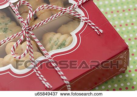 Stock Photo - Spritz cookies in box. Fotosearch