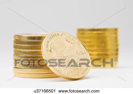 Stack of American coins on white background View Large Photo Image Stock Image - Stack of American coins on white background. Fotosearch