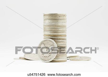 Stack of American coins on white background View Large Photo Image Stock Photograph - Stack of American coins on white background. Fotosearch