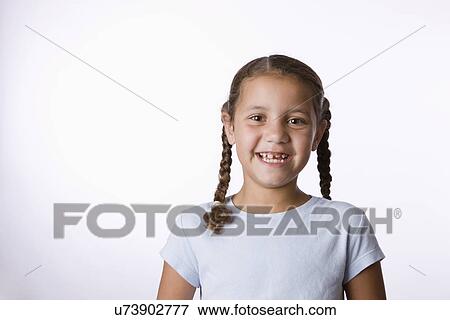 Studio portrait of girl (8-9) View Large Photo Image Stock Photo - Studio portrait of girl (8-9). Fotosearch