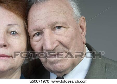 Studio portrait of senior couple View Large Photo Image Stock Image - Studio portrait of senior couple. Fotosearch